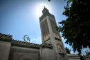 A picture taken on May 24, 2020 shows the minaret and facade of the Great Mosque of Paris, on the second weekend after France eased lockdown measures taken to curb the spread of the COVID-19 pandemic, caused by the novel coronavirus. (Photo by STEPHANE DE SAKUTIN / AFP)
