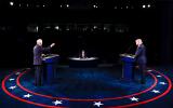 US President Donald Trump (R) Democratic Presidential candidate, former US Vice President Joe Biden and moderator, NBC News anchor, Kristen Welker (C) participate in the final presidential debate at Belmont University in Nashville, Tennessee, on October 22, 2020. / AFP / POOL / JIM BOURG
