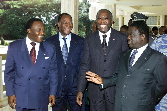 De gauche à droite : Robert Gueï, Alassane Ouattara, Laurent Gbagbo et Henri Konan Bédié, à Yamoussoukro, le 22 janvier 2002.