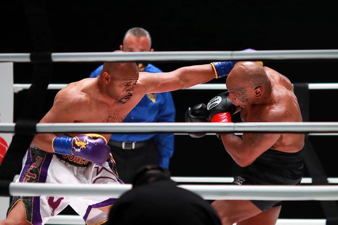 Roy Jones Jr punches Mike Tyson, during a boxing match, Saturday, November 28, 2020, in Los Angeles.