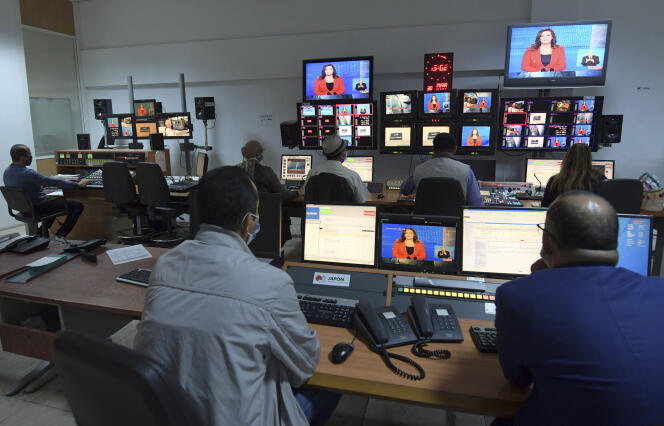 November 14, 2020 Journalists work in the newsroom of the Tunisian public national television channel Vatania
