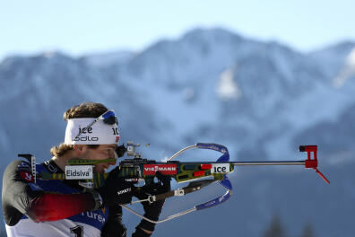 Sturla Holm Laegreid of Norway shoots during the men's 12.5 km pursuit race at the Biathlon World Cup in Hochfilzen, Austria, Saturday, Dec.19, 2020. (AP Photo/Matthias Schrader)