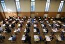 High school students take the philosophy exam, the first test session of the 2019 baccalaureate (high school graduation exam) on June 17, 2019 at the Pasteur high school in Strasbourg, eastern France. (Photo by FREDERICK FLORIN / AFP)
