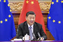 In this photo released by Xinhua News Agency, Chinese President Xi Jinping speaks during a video conference with European leaders from Beijing on Wednesday, Dec. 30, 2020. European Union top officials and Chinese President Xi Jinping have concluded a long-awaited business investment deal with the potential to annoy the new American administration. (Li Xueren/Xinhua via AP)