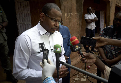 (FILES) In this file photo taken on March 29, 2020 Malian Prime Minister Boubou Cisse addresses the media after casting his ballot for the parliamentary elections in Bamako. - The Malian authorities said on December 31, 2020 they had charged six prominent figures, including a former prime minister Cisse, with seeking to mount a coup, a move that came after a military putsch in August, their lawyers said. (Photo by MICHELE CATTANI / AFP)