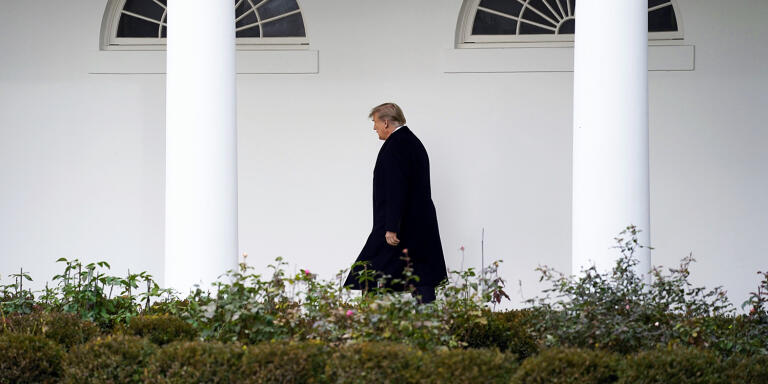 President Donald Trump walks to the White House, Thursday, Dec. 31, 2020, in Washington. Trump is returning to Washington after visiting his Mar-a-Lago resort. (AP Photo/Evan Vucci)/DCEV408/20366681360508//2012312000