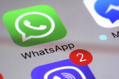 FILE - This Friday, March 10, 2017, file photo shows the WhatsApp communications app on a smartphone, in New York. In early January 2021, encrypted messaging apps Signal and Telegram are seeing huge upticks in downloads from Apple and Google's app stores, while WhatsApp's growth is on the decline following a privacy fiasco where the company was forced to clarify a message it sent to users. (AP Photo/Patrick Sison, File)