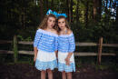 TWINSBURG, OH - AUGUST 03: (EDITOR'S NOTE: Image was processed using digital filters.) Identical twin sisters attend the Twins Days Festival at Glenn Chamberlin Park on August 3, 2019 in Twinsburg, Ohio. Twins Day celebrates biological twins and has been held every summer since 1976. Josie Gealer/Getty Images/AFP
