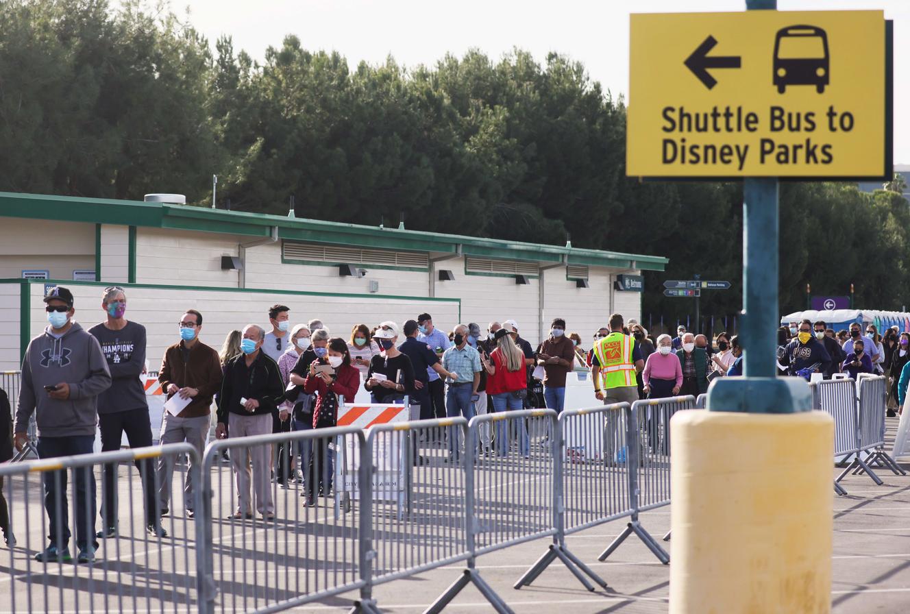 The people of California are waiting in the parking lot at Disneyland Amusement Park in Anaheim on January 13 for their vaccinations.