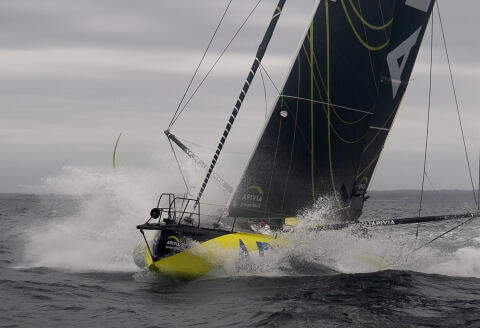 French skipper Charlie Dalin sails his Imoca 60 monohull 'Apivia', on September 30, 2020, off Port-la-Foret, western France, a few weeks prior to take the start of the Vendee Globe around the world solo sailing race. (Photo by Loic VENANCE / AFP)