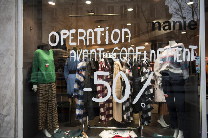 Une opération promotionnelle avant les soldes d’hiver dans un magasin parisien, le 12 janvier.