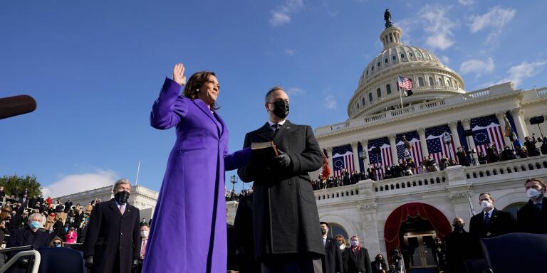 Kamala Harris (L), with her husband Second Gentleman Doug Emhoff, (C) is sworn in by Justice Sonia Sotomayor (R) as US President-elect Joe Biden look on as the 49th US Vice President by Supreme Court Justice Sonia Sotomayor on January 20, 2021, at the US Capitol in Washington, DC.  / AFP / POOL / Andrew Harnik

