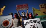 Demostrators take part in a protest against Brazil's President Jair Bolsonaro and his handling of the coronavirus disease (COVID-19) outbreak in Brasilia, Brazil January 24, 2021. REUTERS/Adriano Machado