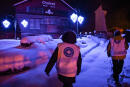 Members of NGO 'Medecins du Monde' (MdM) patrol in search of migrants on November 29, 2019 in the skiresort of Montgenevre in the French Alps near the Italian border. - Due to police pressure, migrants take more and more risks to cross the border. (Photo by PHILIPPE DESMAZES / AFP)