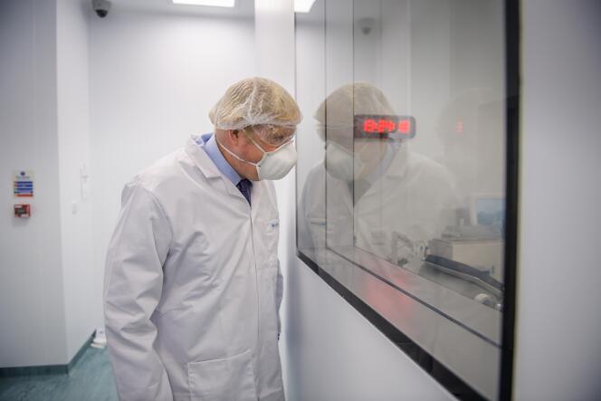 British Prime Minister Boris Johnson visits the Franco-Austrian laboratory Valneva in Livingston (Scotland), January 28, 2021.