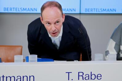 FILE PHOTO: German media group Bertelsmann CEO Thomas Rabe arrives for the annual news conference in Berlin, Germany, March 28, 2017. REUTERS/Hannibal Hanschke/File Photo