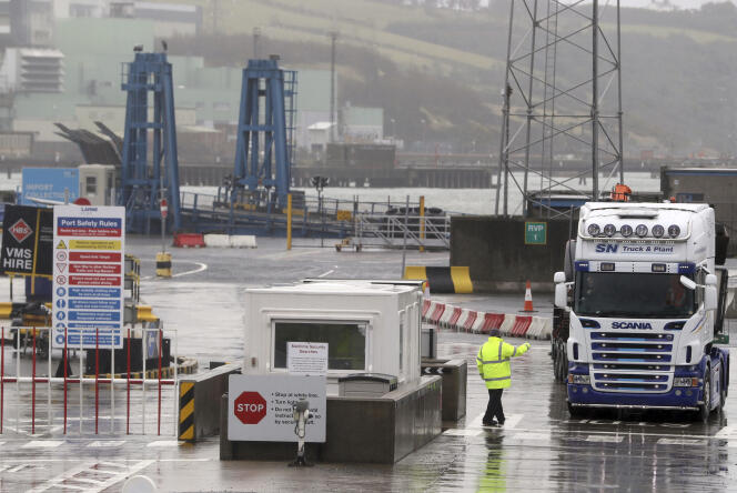 Trucks leave the port of Larne, Belfast, Northern Ireland on Wednesday 3 February 2021. Senior politicians from Britain, Northern Ireland and the European Union met on Wednesday to try to defuse trade tensions after Northern Ireland.