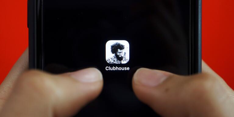 The social audio app Clubhouse is seen on a mobile phone in this illustration picture taken February 8, 2021. REUTERS/Florence Lo/Illustration