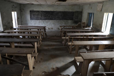 An empty class room following an attack by gunmen at Government Science College, Kagara, Nigeria, Thursday, Feb. 18, 2021. Gunmen have attacked a school in Nigeria's northcentral Niger State, killing at least one student and abducting more than 40 people including students and teachers, according to an official, teacher and a prefect. (AP Photo)
