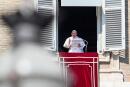 Pope Francis speaks from the window of the apostolic palace overlooking St. Peter's Square on February 21, 2021 during the weekly Angelus prayer in The Vatican, as security cameras are seen in the foreground. / AFP / Vincenzo PINTO 