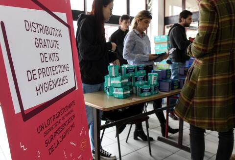 French students collect free hygiene products on presentation of their multi-service student card (CMS) on January 15, 2019, at Lille University campus in Villeneuve d’Ascq, northern France. - The distribution of 30,000 hygiene kits is running for 4 days in the universities of Lille, Villeneuve d’Ascq and Roubaix. (Photo by DENIS CHARLET / AFP)