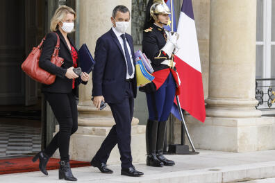 French Ecological Transition Minister Barbara Pompili (L) and French Interior Minister Gerald Darmanin leave the Elysee presidential Palace on October 7, 2020 in Paris after attending the weekly cabinet meeting. (Photo by Ludovic MARIN / AFP)