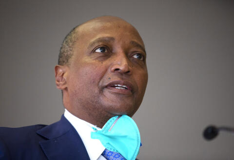 Patrice Motsepe the South African candidate to the Confederation of African Football (CAF) addresses the media during a press conference delivering his manifesto in Johannesburg on February 25, 2021. - Motsepe is running against three other candidates, Jacques Anouma of Ivory Coast, Augustin Senghor of Senegal and Ahmed Yahya of Mauritania. (Photo by Phill Magakoe / AFP)