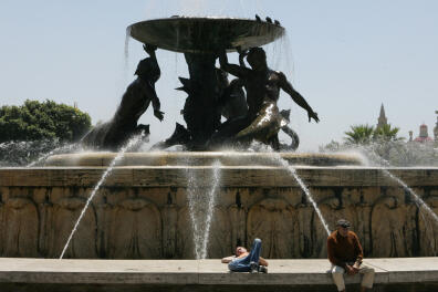 Picture taken 10 May 2007 in Malta of The Triton Fountain. AFP PHOTO / ANDREAS SOLARO (Photo by ANDREAS SOLARO / AFP)