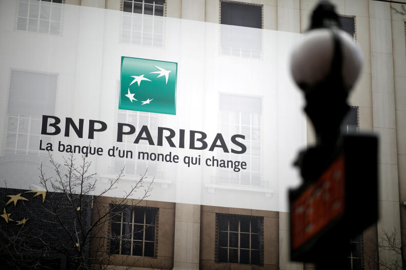 FILE PHOTO: The BNP Paribas logo is seen at a branch in Paris, France, February 4, 2020. REUTERS/Benoit Tessier/File Photo GLOBAL BUSINESS WEEK AHEAD