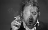 (FILES) A file photo taken on March 11, 1984 shows French singer-songwriter Serge Gainsbourg smoking during the 7 sur 7 tv show at the Studio Cognacq-Jay in Paris. March 2, 2021 will mark the 30th anniversary of Serge Gainsbourg's death. / AFP / PHILIPPE WOJAZER 