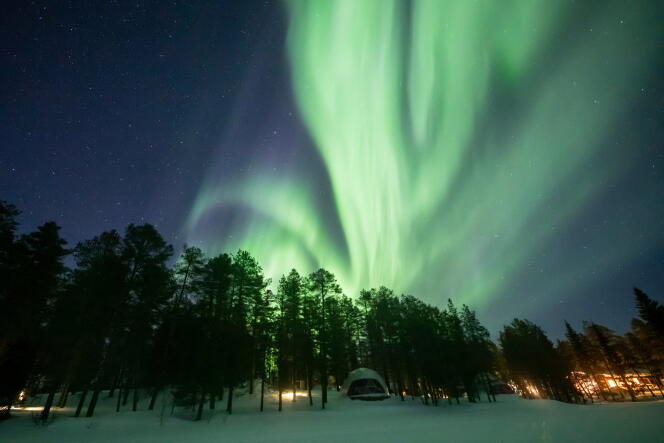 Aurole boréale à Torassieppi, en Laponie, le 2 mars 2021. Pour la quatrième année consécutive, la Finlande se classe en tête des pays les plus heureux du monde.