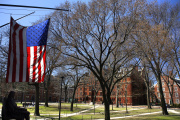 Flag hanging outside Harvard University in Cambridge, Massachusetts.