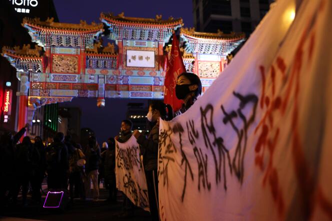 Rassemblement en hommage aux victimes des fusillades d’Atlanta, dans le quartier chinois de Washington, DC, le 17 mars.