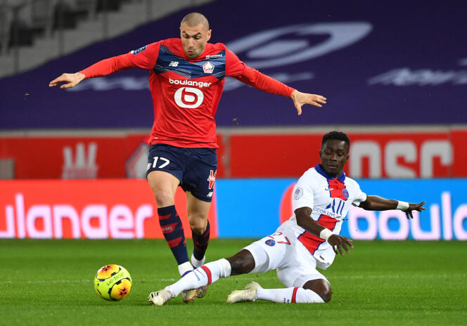 Burak Yilmaz, lors du match aller contre le Paris-Saint-Germain, à Lille, le 20 décembre.
