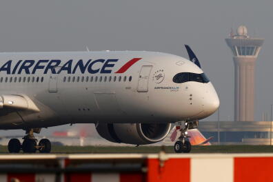 An Air France Airbus A350 airplane lands at the Charles-de-Gaulle airport in Roissy, near Paris, France April 2, 2021. REUTERS/Christian Hartmann