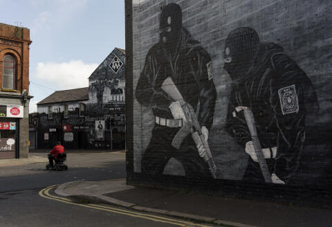 BELFAST, NORTHERN IRELAND - APRIL 10, 2021: Loyalist murals honouring paramilitary groups can be seen seen depicted on residential walls along Newtownards Road, a prominent Loyalist and Protestant neighbourhood in East Belfast. Days of violence across Northern Ireland, have raised concerns that tensions could escalate amid anger over the fallout from Brexit and the coronavirus pandemic, endangering the region’s strained peace process. The Unionist community says they feel betrayed by the British government and feel that Northern Ireland’s place in the union is very much under pressure as a result.