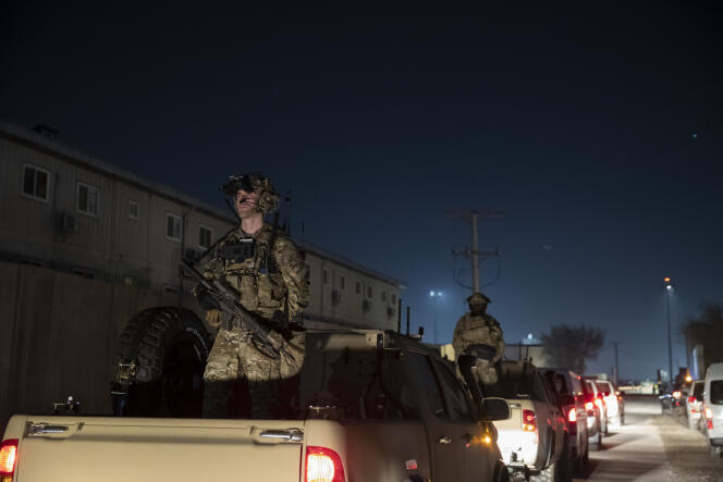 Lors d’une visite de l’ancien président américain, Donald Trump, aux troupes de la base de Bagram en Afghanistan, en novembre 2019.