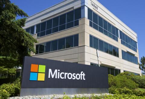 (FILES) In this file photo taken on July 16, 2014 A building on the Microsoft Headquarters campus is pictured July 17, 2014 in Redmond, Washington. - Microsoft on Monday said it will buy software development platform GitHub, in a deal worth $7.5 billion. (Photo by STEPHEN BRASHEAR / GETTY IMAGES NORTH AMERICA / AFP)