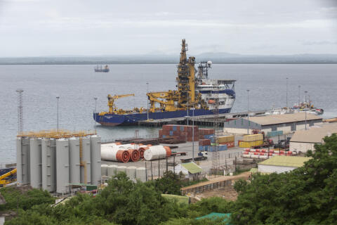 The OCSV Sapura Diamante (Offshore Construction Support Vessel), a pipe layer vessel used in offshore construction, is seen docked at the port of Pemba where sailing boats are expected to arrive with people displaced from the coasts of Palma and Afungi after suffering attacks by armed groups on March 30, 2021. - The United States on Monday vowed to support Mozambique after a prolonged deadly assault on the key northern town of Palma by Islamic State-linked militants waging an escalating insurgency. The town was all but deserted five days after the raid was launched, its residents fleeing by road, boat or on foot. The militants attacked the town on Wednesday, spiralling an insurgency that has spread bloodily across northern Mozambique since 2017. (Photo by Alfredo Zuniga / AFP)