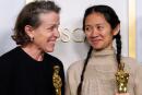 Producers Frances McDormand and Chloe Zhao, hold the Oscar for Best Picture for "Nomadland" as they pose in the press room at the Oscars on April 25, 2021, at Union Station in Los Angeles. McDormand also won for Actress in a Leading Role for "Nomadland" and Chloe Zhao wond Directing for "Nomadland" - / AFP / POOL / Chris Pizzello
