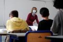 Christine Figer teaches German at the Lycee Buffon secondary school as students return to school in Paris, amid the coronavirus disease (COVID-19) outbreak in France, May 3, 2021. REUTERS/Benoit Tessier