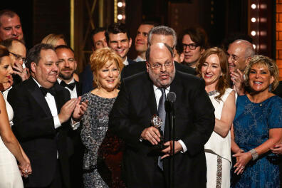 Scott Rudin, center, and the cast of 'Hello, Dolly!' accept the award for best revival of a musical at the 71st annual Tony Awards on Sunday, June 11, 2017, in New York. (Photo by Michael Zorn/Invision/AP)/NYDC111/17163141328475/061117120146/1706120611