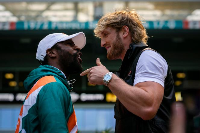 Floyd "Money" Mayweather and Logan "The Maverick" Paul face each other at a press conference on May 6, 2021, in Florida.