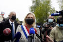 French far-right party Rassemblement National's (RN) President and member of Parliament Marine Le Pen speaks to the press after a ceremony to mark the 76th anniversary of the end of World War II on May 8, 2021, in Henin-Beaumont, eastern France. (Photo by FRANCOIS LO PRESTI / AFP)