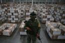 A soldier keeps watch at a warehouse where boxes with voting materials for the upcoming June 6 mid-term election are stored, in Tepotzotlan, on the outskirts of Mexico City, Mexico May 7, 2021. REUTERS/Edgard Garrido