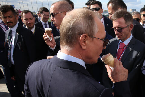 ZHUKOVSKY, RUSSIA - AUGUST 27: (RUSSIA OUT) Russian President Vladimir Putin (R) and Turkish President Recep Tayyip Erdogan (L) eat ice cream while visiting the MAKS 2019 International Aviation and Space Show on August 27, 2019 in Zhukovsky, 40 km east of Moscow, Russia. Erdogan is having a one-day visit to Russia. (Photo by Mikhail Svetlov/Getty Images)