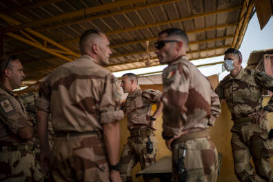 French Barkhane force soldiers who wrapped up a four-month tour of duty in the Sahel leave their base in Gao, Mali Wednesday June 9, 2021. After France suspended joint military operations with Malian forces after the junta led by Col. Assimi Goita retook control of Mali's transitional government May 24 2021, French President Emmanuel Macron announced at a press conference Thursday June 10, 2021 That operation Barkhane would end and be replaced by support for local partners and counter terrorism. (AP Photo/Jerome Delay)