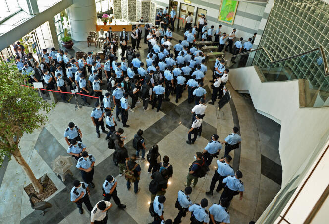 Opération de police au siège du « Apple Daily », le 17 juin 2021 à Hongkong.