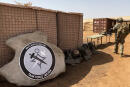 This photograph taken on November 3, 2020 shows the France-led special operations logo for the new Barkhane Task Force Takuba, a multinational military mission in sub-Saharan Africa’s troubled Sahel region made up of soldiers from France, Estonia, the Czech Republic and Sweden, amongst others, and who are due to settle at the military base in Menaka, over the next few weeks. - France has led in building support for the new special operations Task Force Takuba, which will comprise of around 500 special forces personnel, that will train, advise, assist and accompany local forces in their fight against Islamic State and al-Qaeda affiliates in the region. Takuba is expected to be fully operational by the autumn. (Photo by Daphné BENOIT / AFP) / “The erroneous mention[s] appearing in the metadata of this photo by Daphné BENOIT has been modified in AFP systems in the following manner: [Location : MENAKA] instead of [GAO]. Please immediately remove the erroneous mention[s] from all your online services and delete it (them) from your servers. If you have been authorized by AFP to distribute it (them) to third parties, please ensure that the same actions are carried out by them. Failure to promptly comply with these instructions will entail liability on your part for any continued or post notification usage. Therefore we thank you very much for all your attention and prompt action. We are sorry for the inconvenience this notification may cause and remain at your disposal for any further information you may require.”