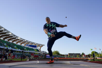 Ryan Crouser competes during the finals of men's shot put at the U.S. Olympic Track and Field Trials Friday, June 18, 2021, in Eugene, Ore. (AP Photo/Charlie Riedel)